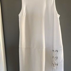 CeCe white lined sleeveless, drop-waist dress.